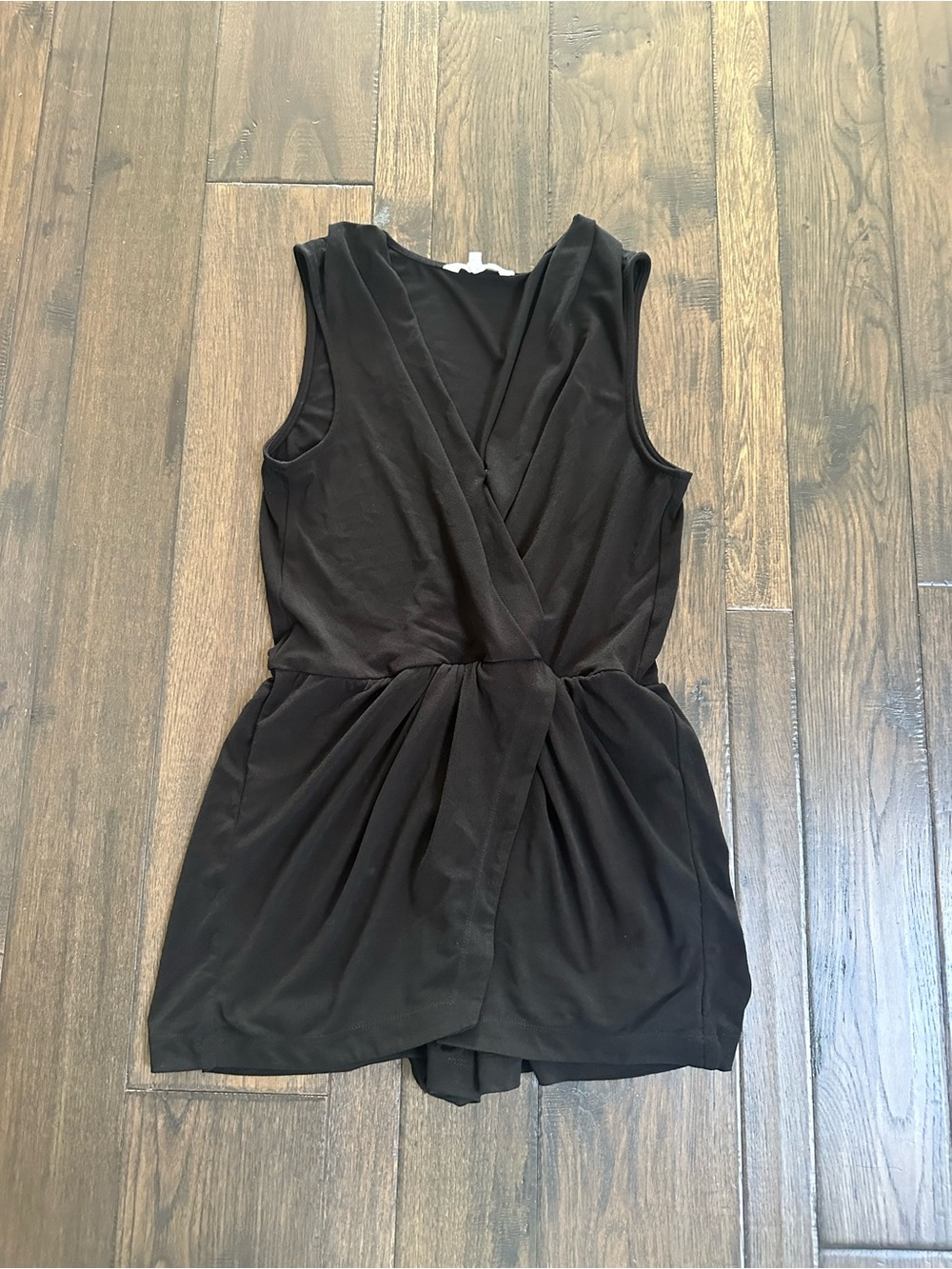 BCBGeneration black sleeveless wrap romper – size medium